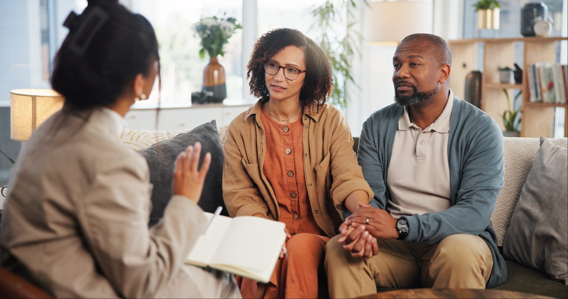 Professional psychiatrist providing psychiatric services and psychotherapy consultation in modern office setting